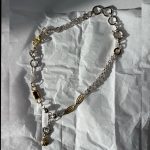 One-of-a-kind chain link with garnet stone