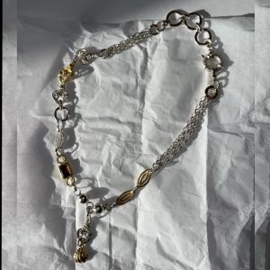 One-of-a-kind chain link with garnet stone